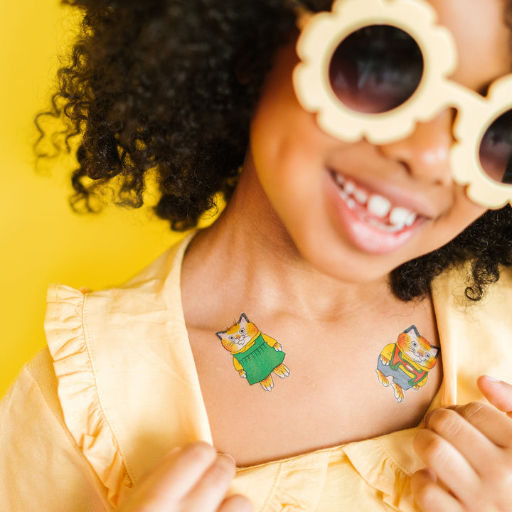 Huckle & Sally Cat Tattly Temporary Tattoos by Richard Scarry On A Person's Neck