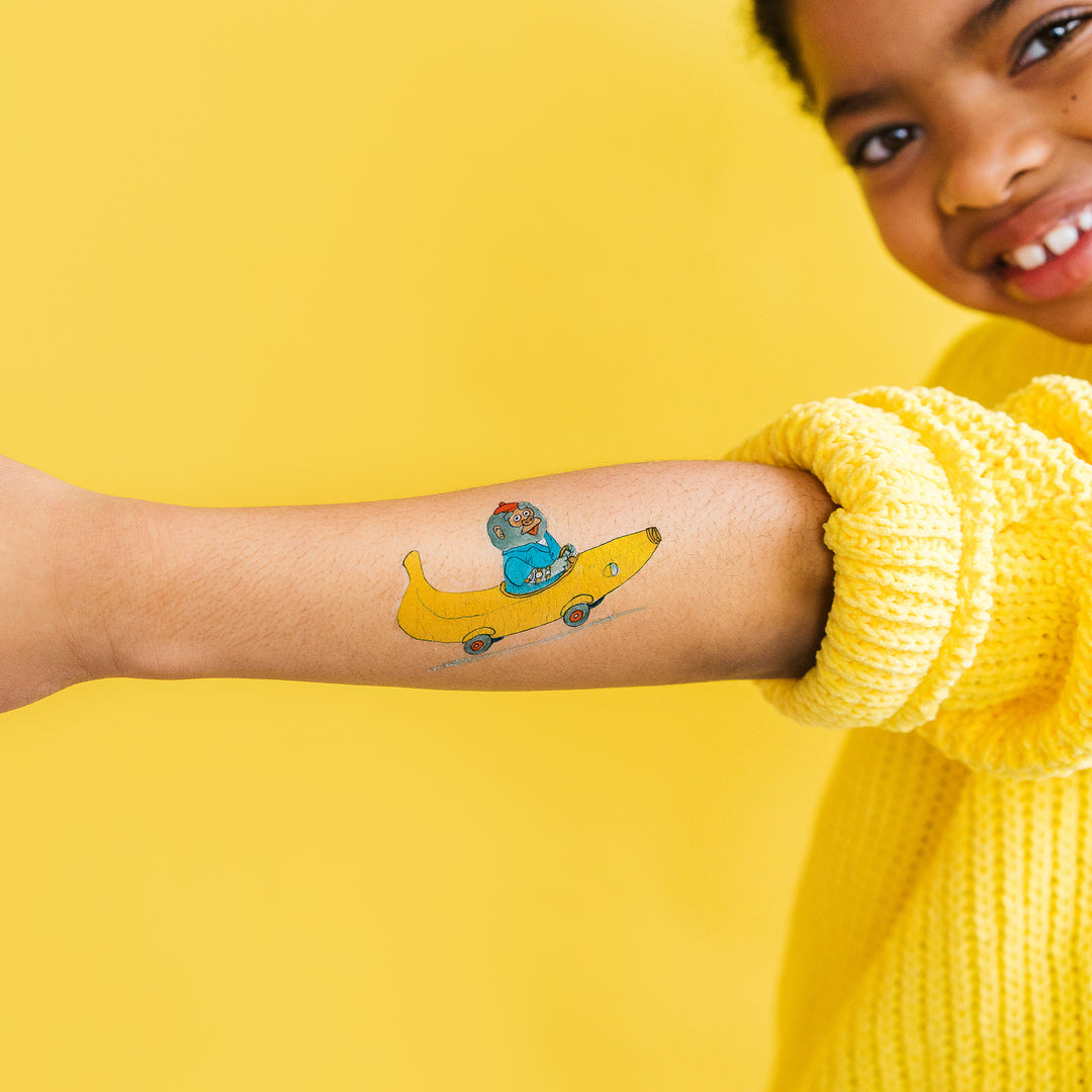 Bananas Gorilla + Car Tattly Temporary Tattoos by Richard Scarry On A Girl's Arm