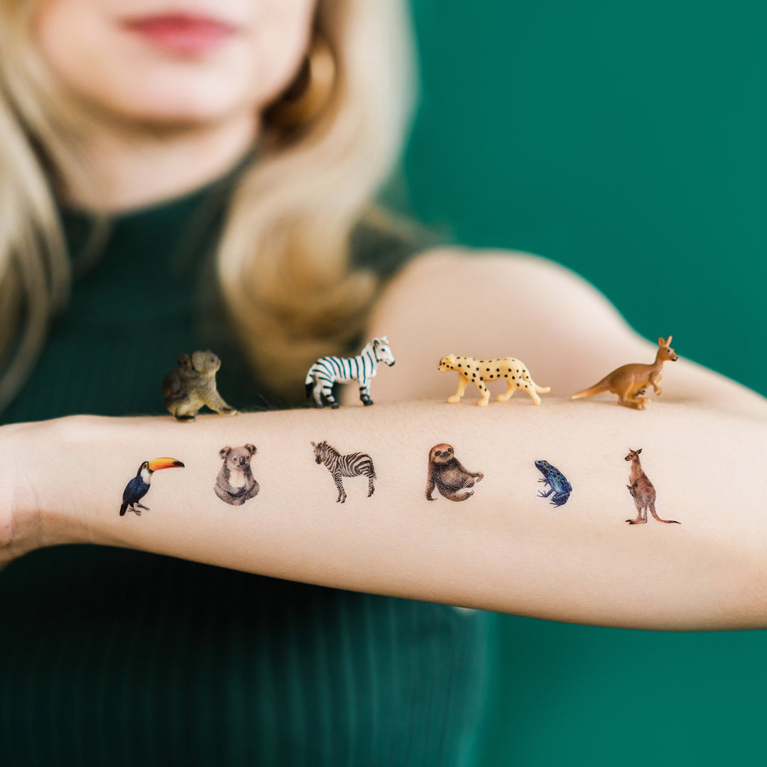 Mini Wild Animal Tattly Temporary Tattoos On A Person's Arm