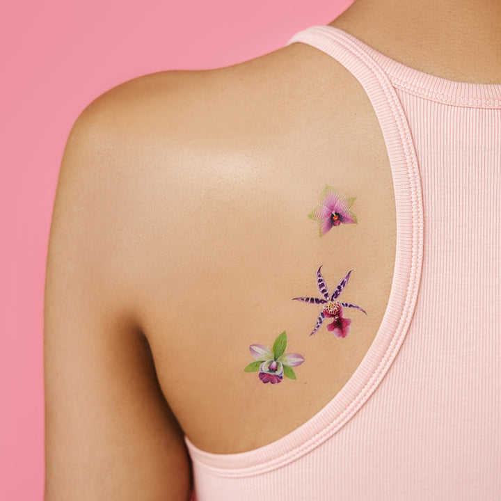 Person Wearing Orchid Temporary Tattoos